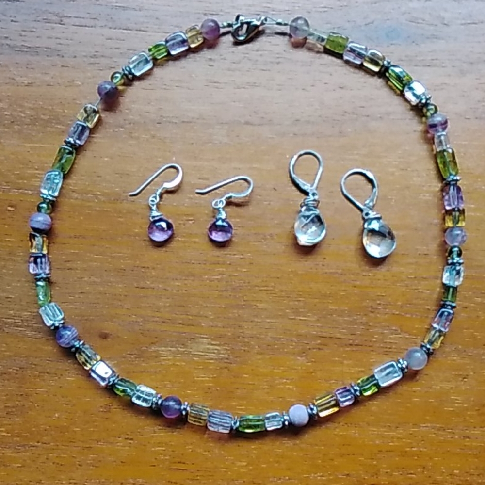 Multicolored bead necklace with 2 sets earrings.